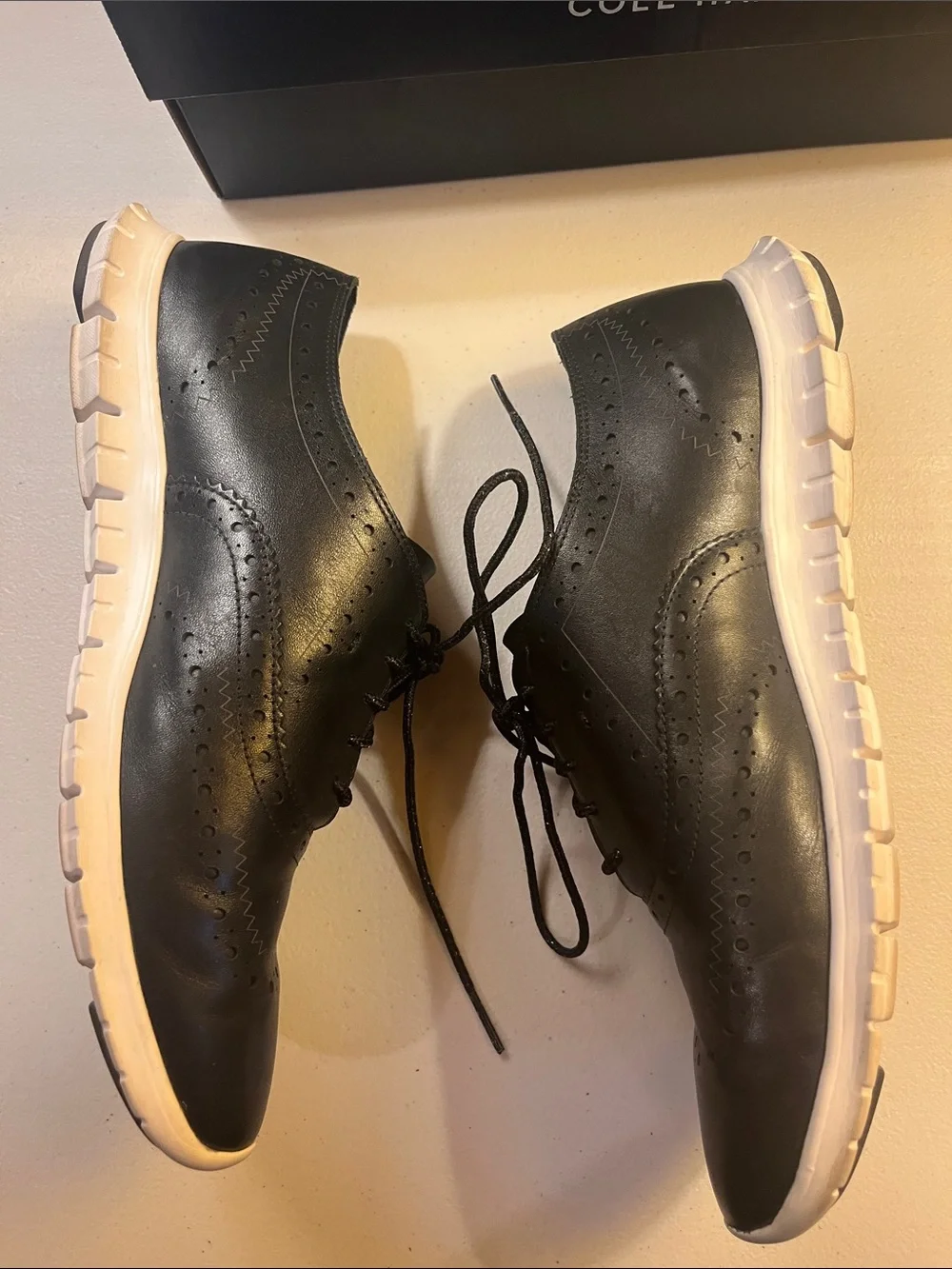 Cole Haan Black Leather Wingtip Sneakers with White Sole